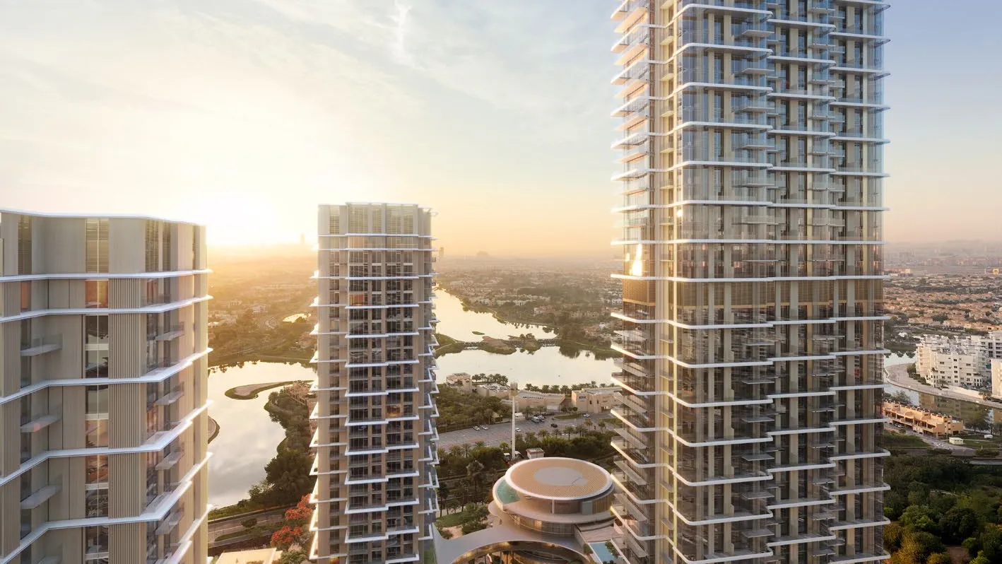 Serenia District towers at sunrise above the Jumeirah Islands lakes
