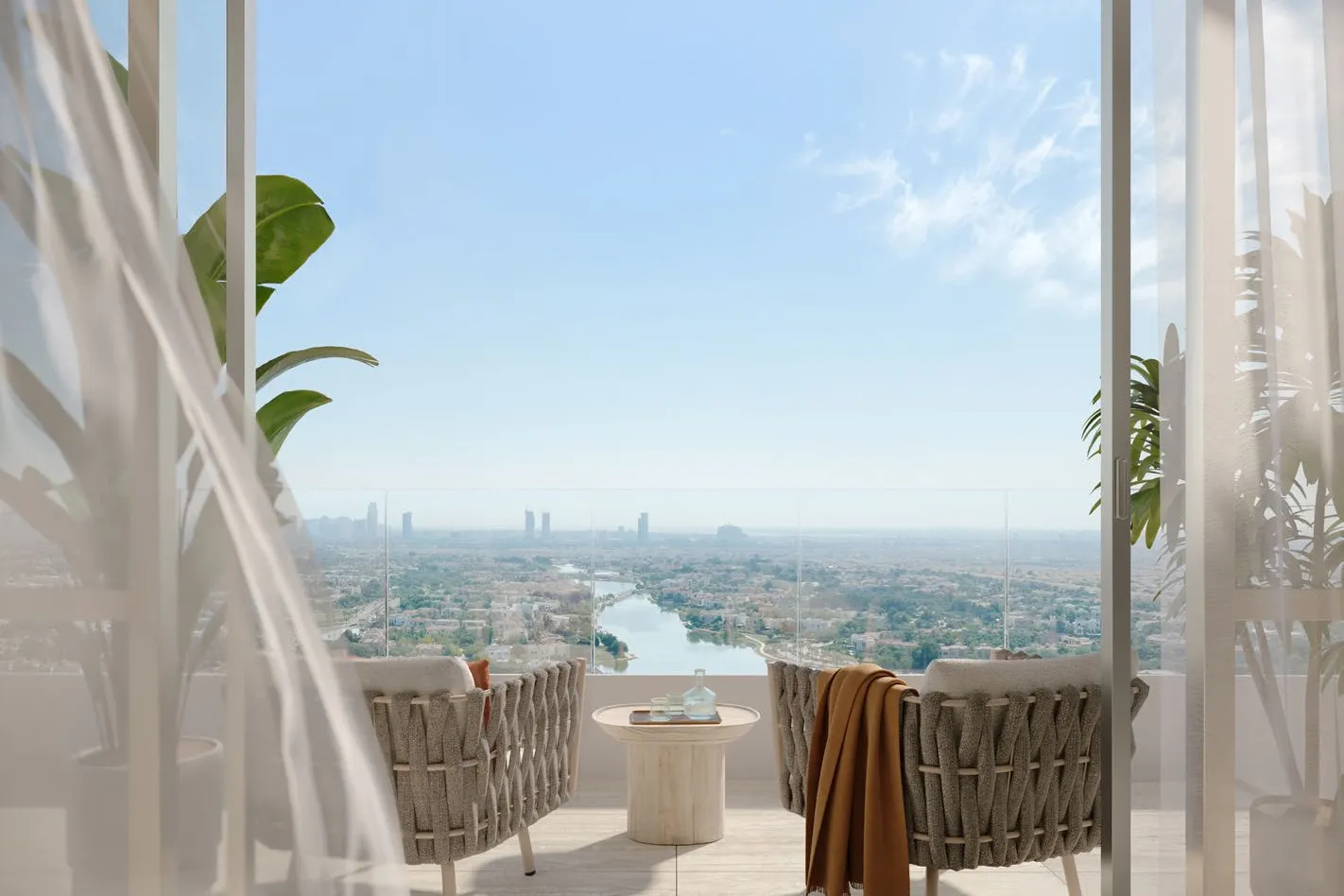 Balcony with two armchairs looking over Jumeirah Islands lakes