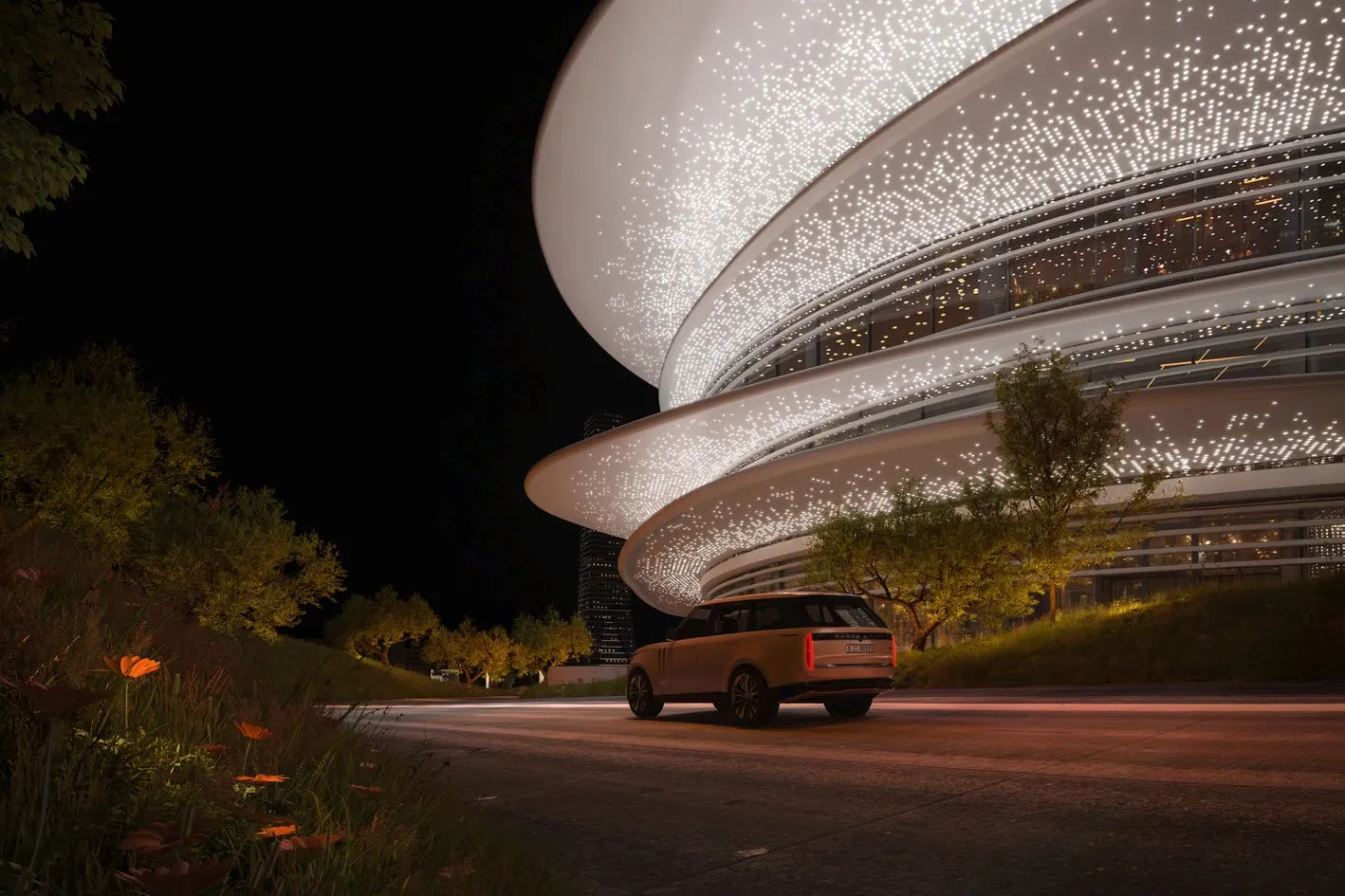 Clubhouse's curved white façade sparkling with lights at night